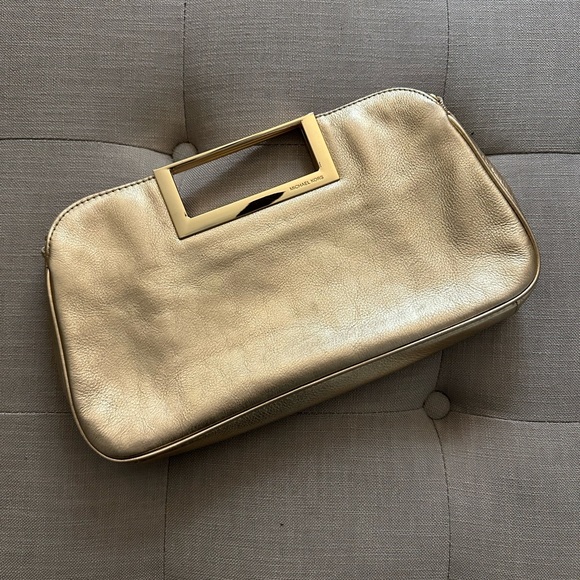 Michael Kors Gold Clutch with Strap. - Picture 1 of 2
